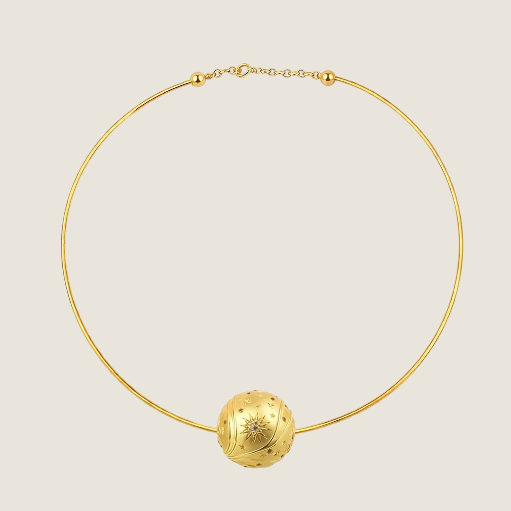 Torque Mirage necklace by Sandrine Barabinot — 18k yellow gold rigid torque with one 16mm sculpted Bubble sphere set with diamonds, from the Kindred collection. Handcrafted in Geneva.