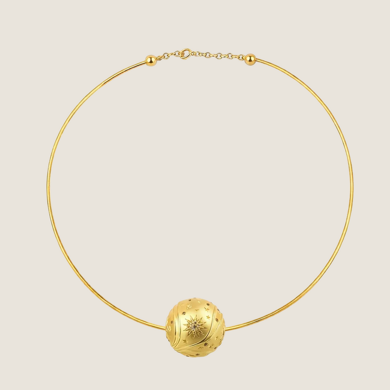 Torque Mirage necklace by Sandrine Barabinot — 18k yellow gold rigid torque with one 16mm sculpted Bubble sphere set with diamonds, from the Kindred collection. Handcrafted in Geneva.