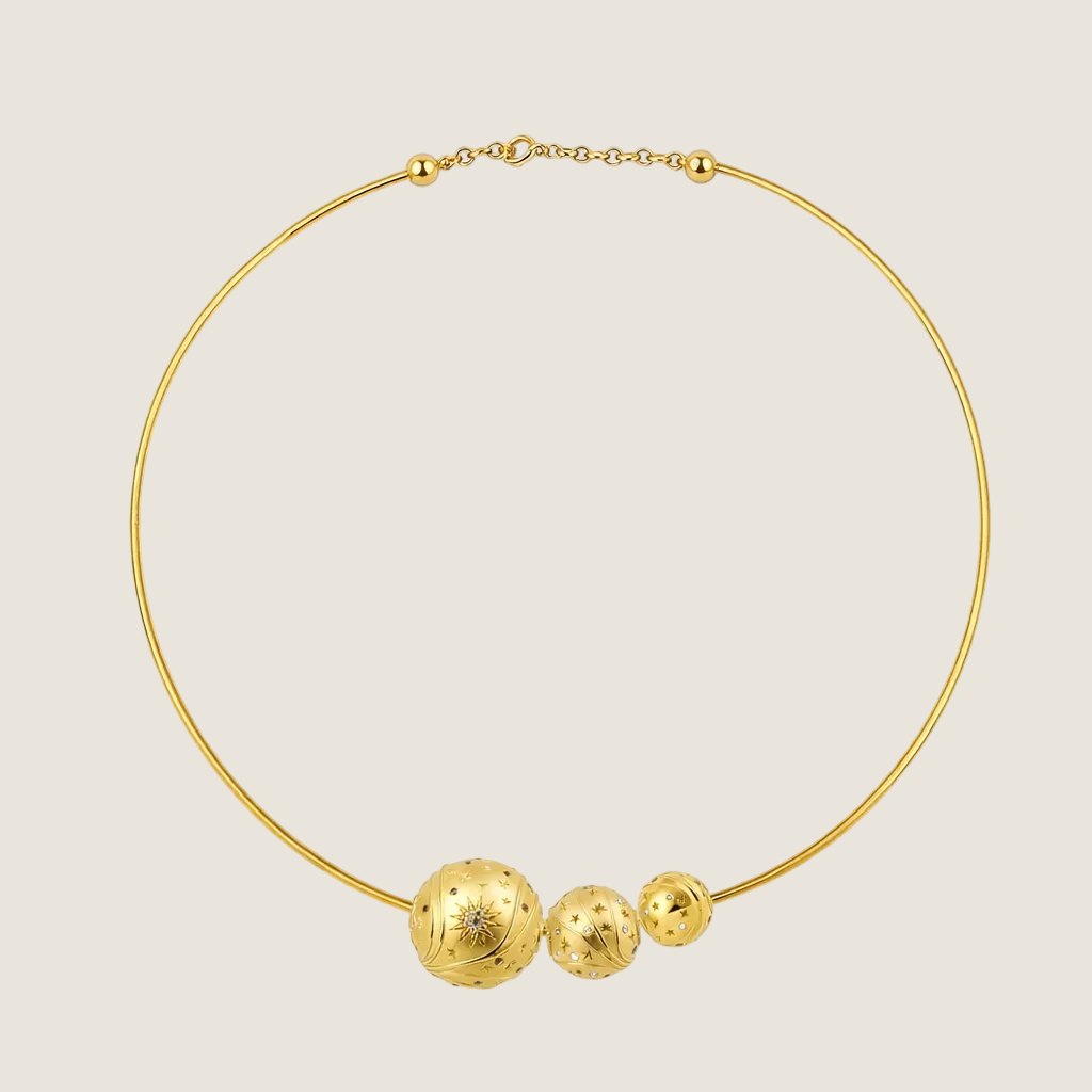 Torque Nomad necklace by Sandrine Barabinot — 18k yellow gold rigid torque with three Bubble spheres (16mm and 12mm brushed gold, 10mm mirror-polished gold), all set with diamonds. Kindred collection. Handcrafted in Geneva.