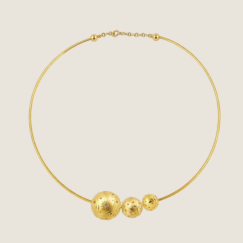 Torque Nomad necklace by Sandrine Barabinot — 18k yellow gold rigid torque with three Bubble spheres (16mm and 12mm brushed gold, 10mm mirror-polished gold), all set with diamonds. Kindred collection. Handcrafted in Geneva.